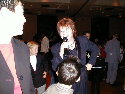 Is the Mrs. Schermerhorn trying karaoke?